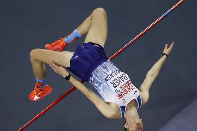<p>Chris Baker competes in the men’s high jump</p>
