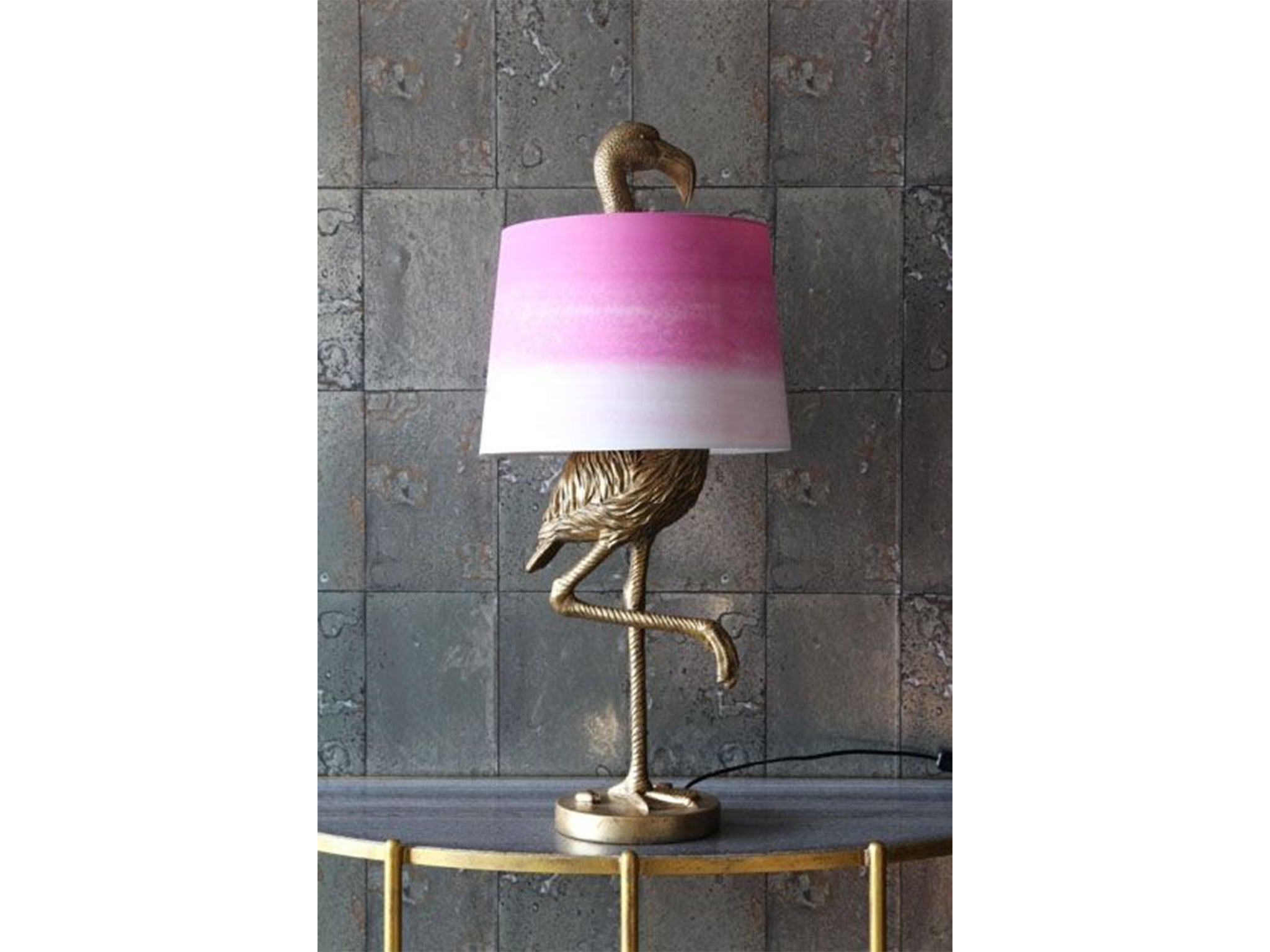 One for the maximalists, this flamingo lamp doubles up as a statement piece of decor too