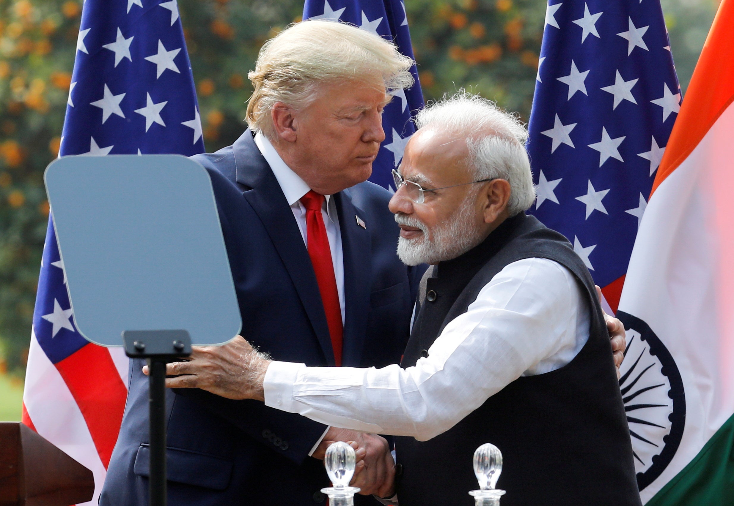 US President Donald Trump and India’s Prime Minister Narendra Modi embrace during a joint news conference after bilateral talks at Hyderabad House in New Delhi, India, February 25, 2020. (REUTERS/Adnan Abidi/File Photo)