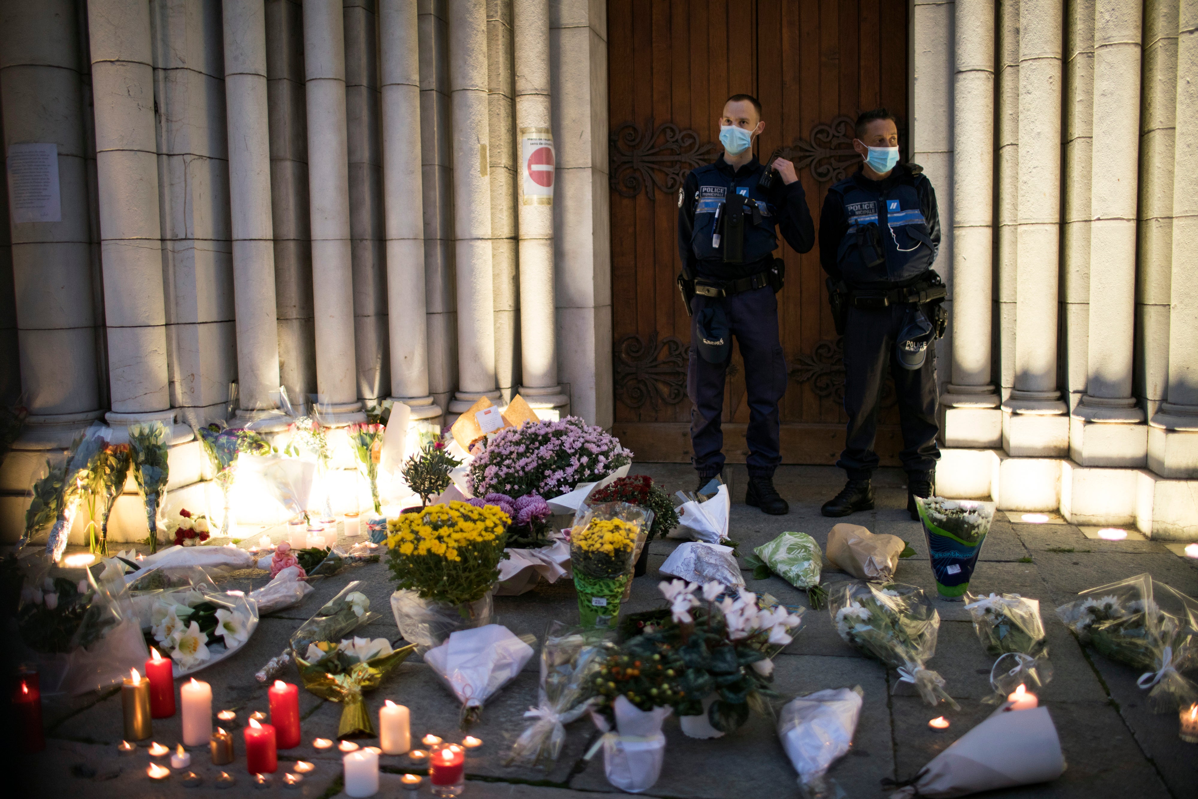 Tributes to the victims of the Nice attack outside the Notre-Dame basilica