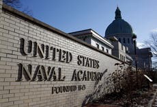 Midshipman asks judge to block his removal over tweets