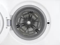 Firefighters rescue three men trapped in giant tumble dryer
