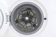 Firefighters rescue three men trapped in giant tumble dryer