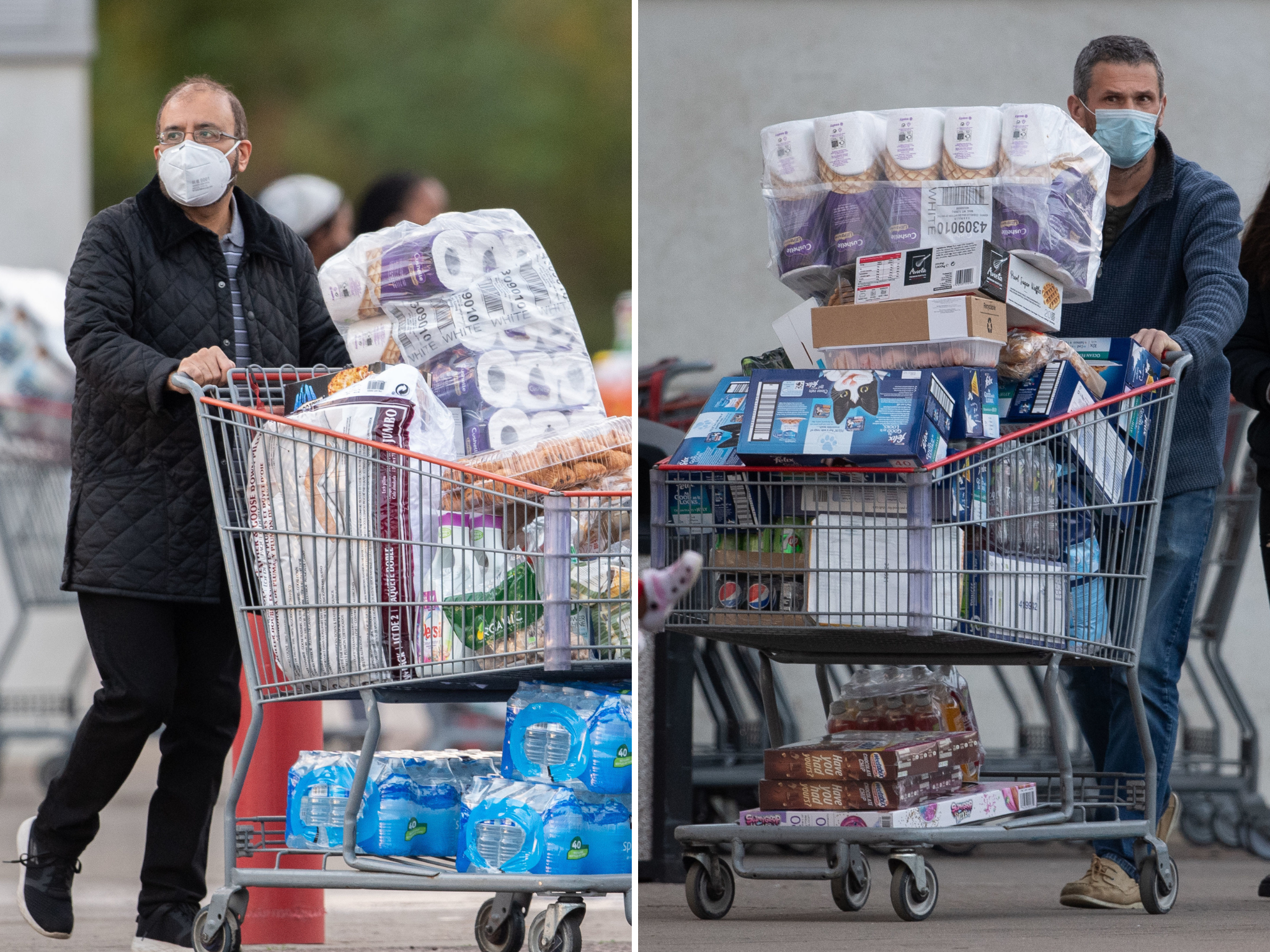 <p>Two shoppers leave Costco on Saturday as Boris Johnson prepared to announce a second lockdown</p>