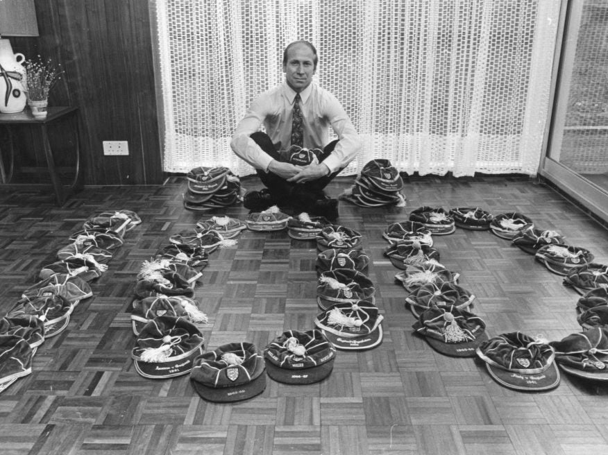 Sir Bobby Charlton surrounded by his century of England caps