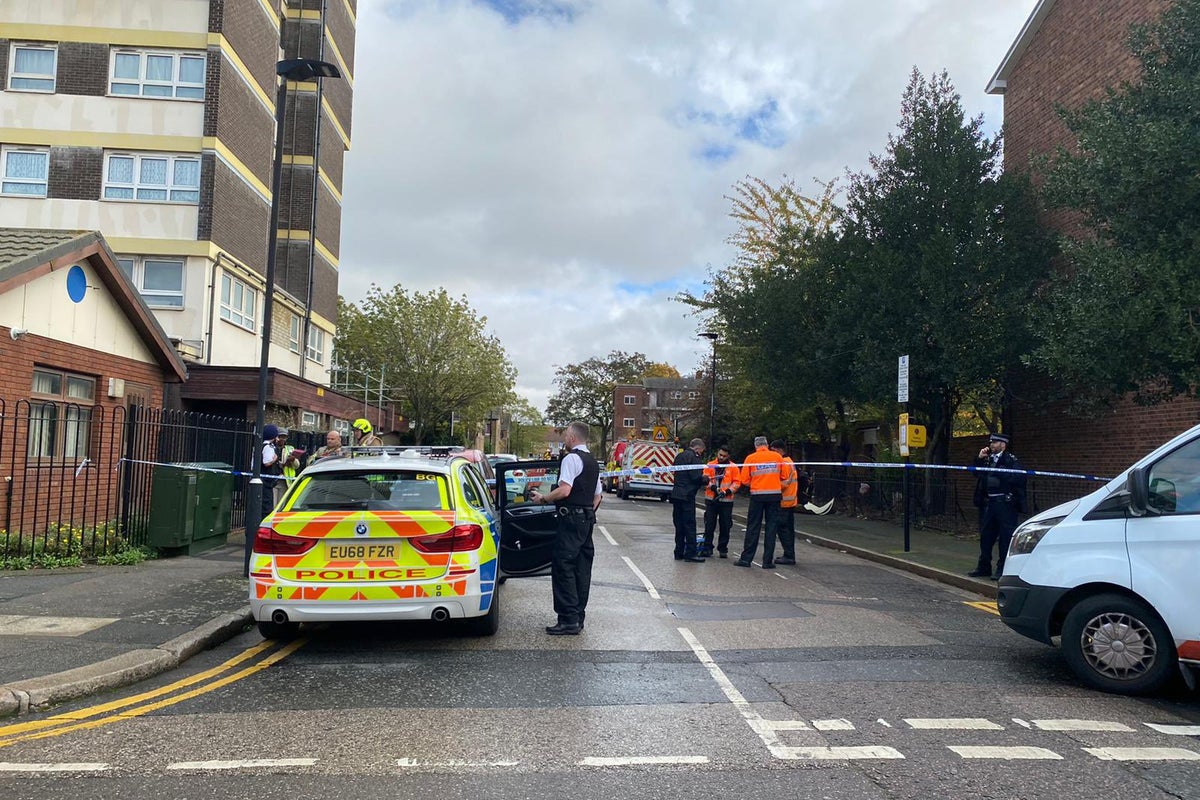 Man dies after suspected gas explosion rips through east London flats ...