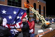 Scaffolding draped in American flag collapses at Trump rally
