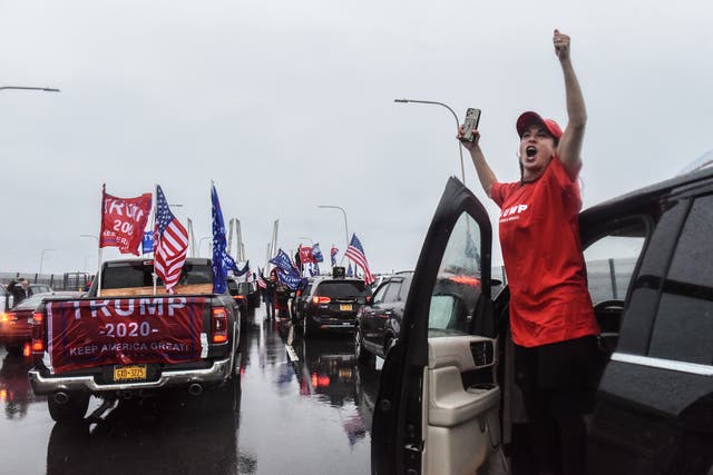 <p>Trump supporters were out in force in caravans of vehicles across the country on Sunday (pictured in New York state)</p>