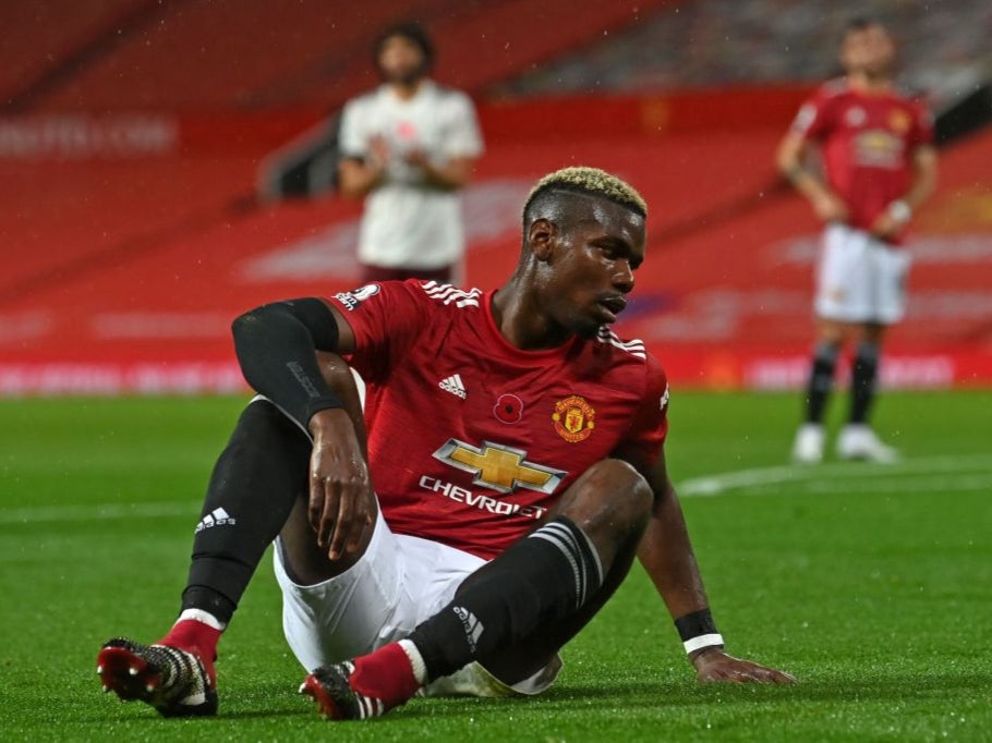 Paul Pogba reacts after giving away a penalty against Arsenal