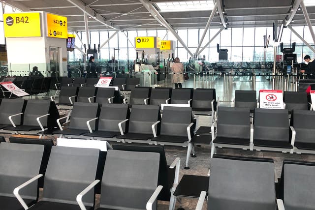 Waiting game: a departure gate at Heathrow Terminal 5