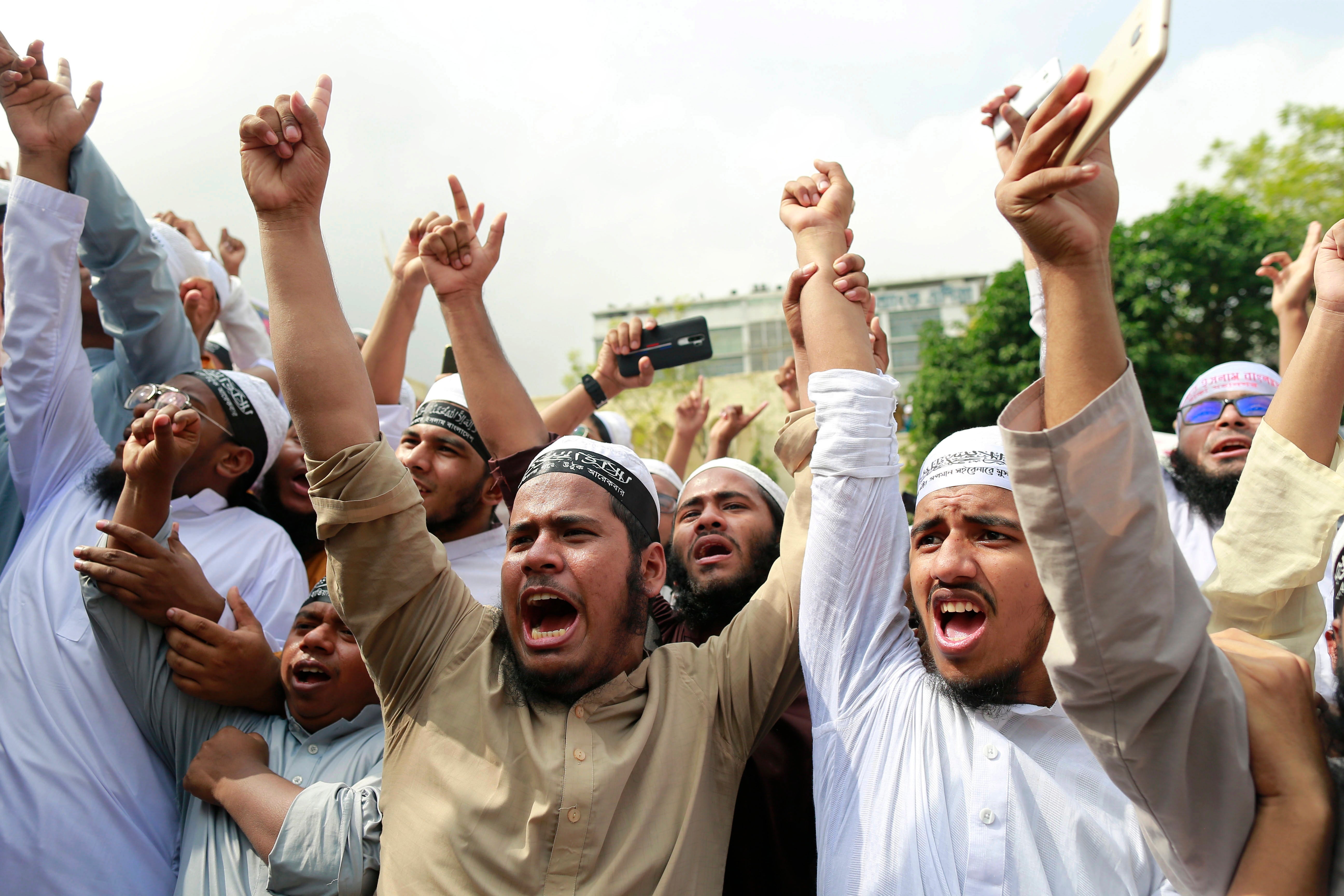 Members of the Hefazat-e-Islam Bangladesh pictured during an anti-France protest in Dhaka on Monday