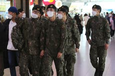 Asia Today: South Korea OKs single test for COVID-19 and flu