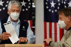 2020 polls open as Trump and Biden go head to head for presidency