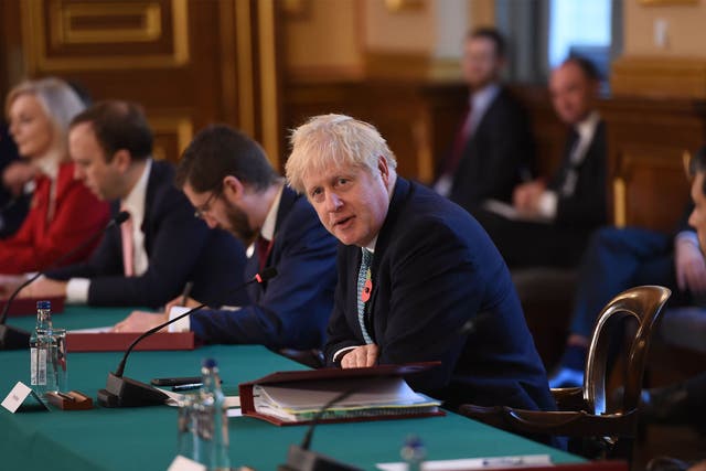 <p>Boris Johnson speaks to his cabinet</p>