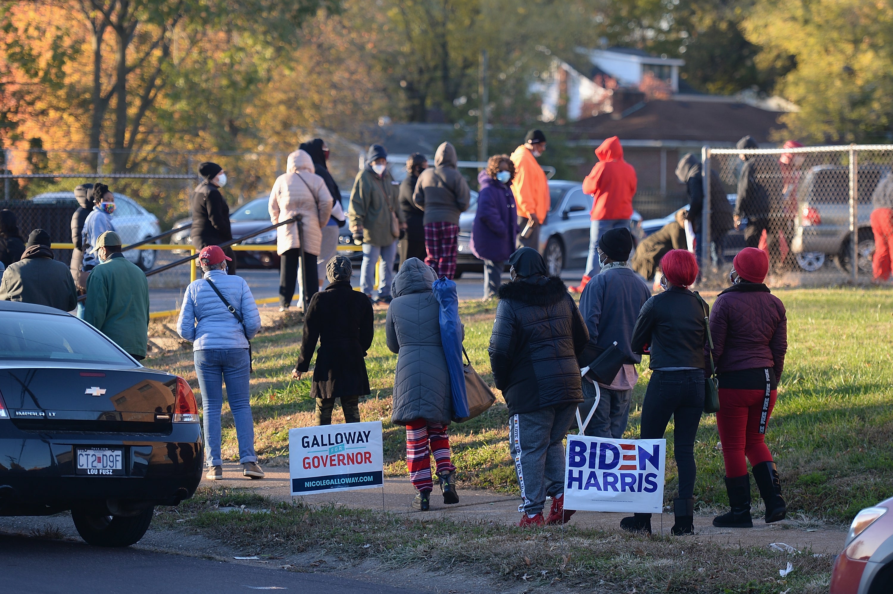 Voters wait on line to cast their ballots on Election Day on November 3, 2020 at Jennings Senior High School in St Louis, Missouri.  