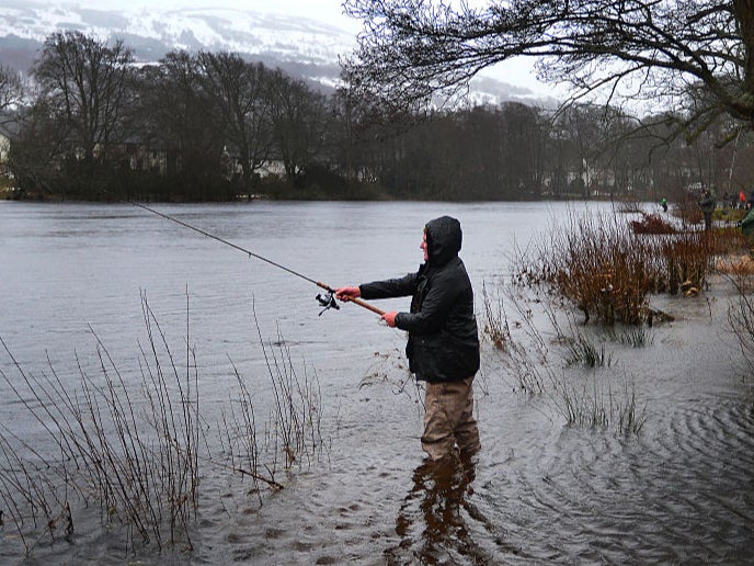 An angler on the banks of the river Tay