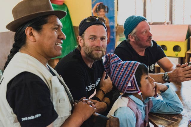 Ewan McGregor and Charley Boorman attend an indigenous bilingual lesson at Challamayu School in Bolivia. The Unicef programme has supported these classes, taught in both Spanish and the traditional Quechuan, with Adan Puri, an education officer who has created a new curriculum for the school