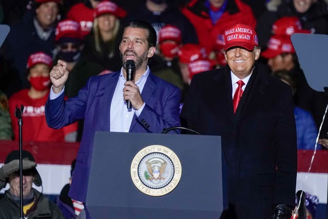 President Donald Trump watches as Donald Trump Jr speaks at a campaign event at the Kenosha Regional Airport on Monday 2, November 2020, in Kenosha, Wisconsin