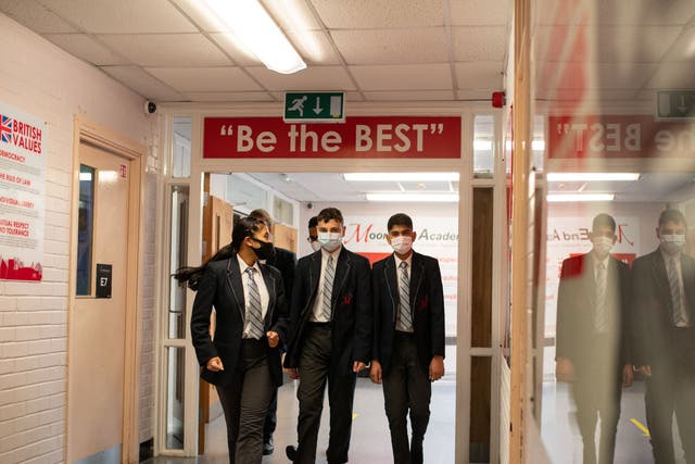 <p>Pupils in secondary schools in England must wear face masks when moving around school </p>