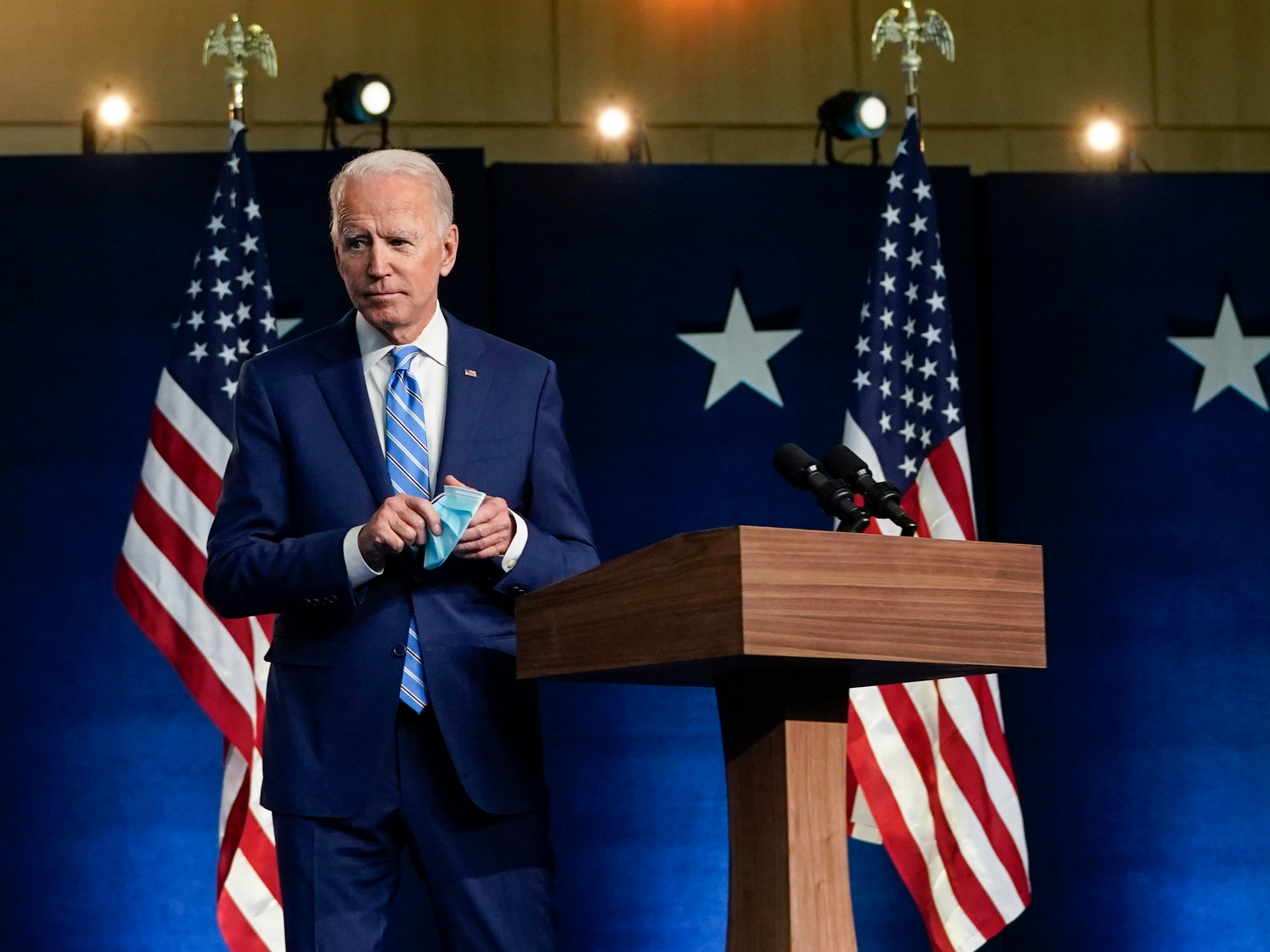 Joe Biden leaves the lectern after speaking on 4 November 2020 in Wilmington, Delaware