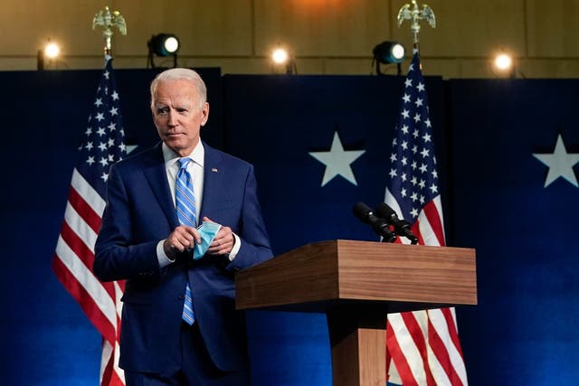 Joe Biden leaves the lectern after speaking on 4 November 2020 in Wilmington, Delaware