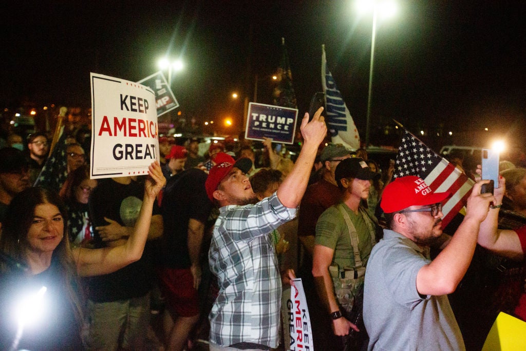Pro-Trump demonstrators gathered outside the Maricopa County Elections Office building on Wednesday as the Arizona vote count continued rolling in