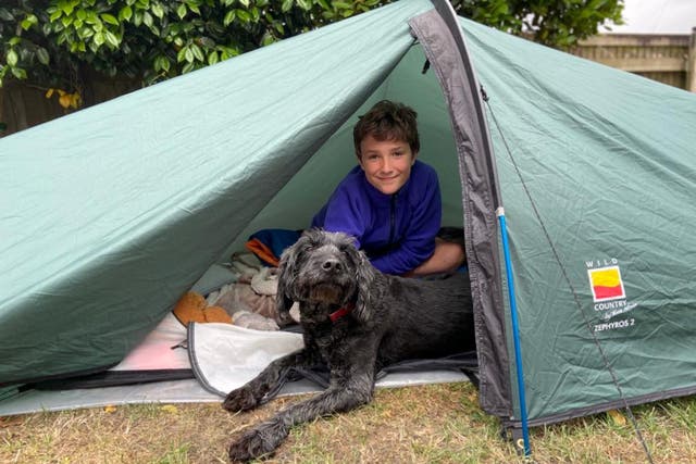 A North Devon boy is camping in his garden to raise money for charity