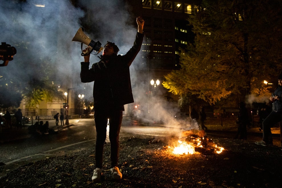 A demonstrator takes to the streets of Portland