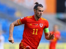 Bale returns for Wales in squad selected by absent coach Giggs