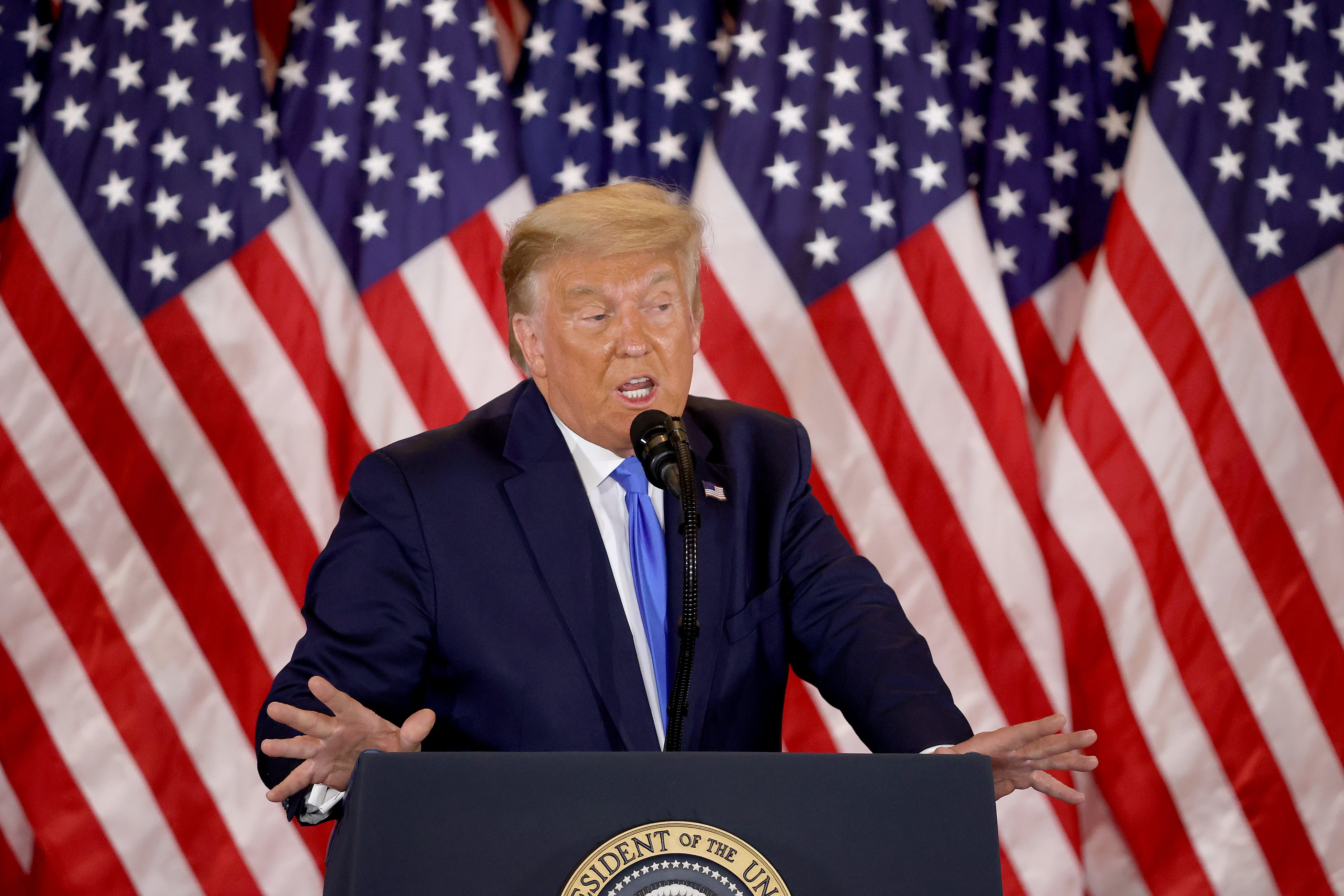 US President Donald Trump speaks on election night in the East Room of the White House in the early morning hours of 4 November, 2020 in Washington, DC.