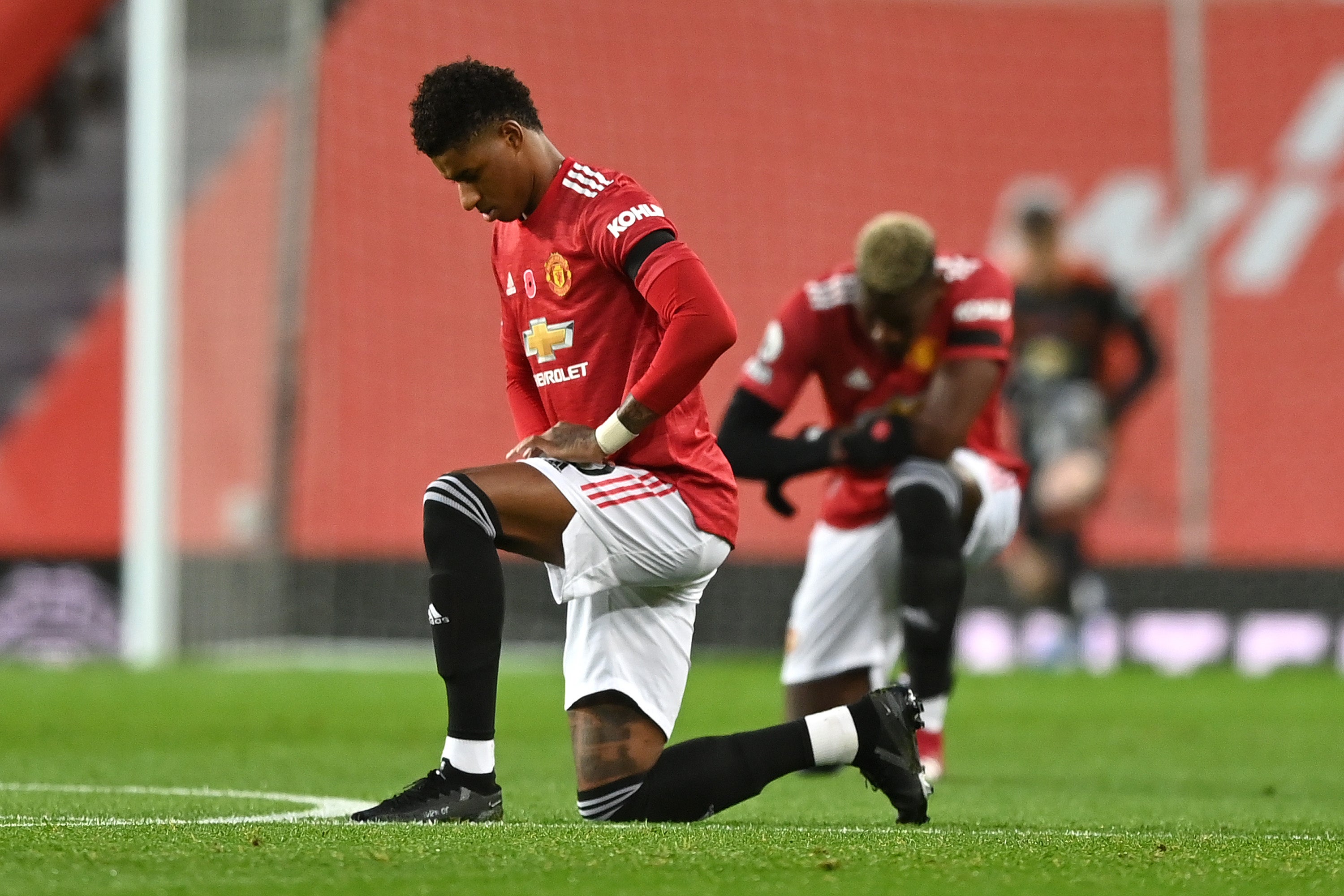 Marcus Rashford of Manchester United takes a knee in support of the Black Lives Matter movement on 1 November