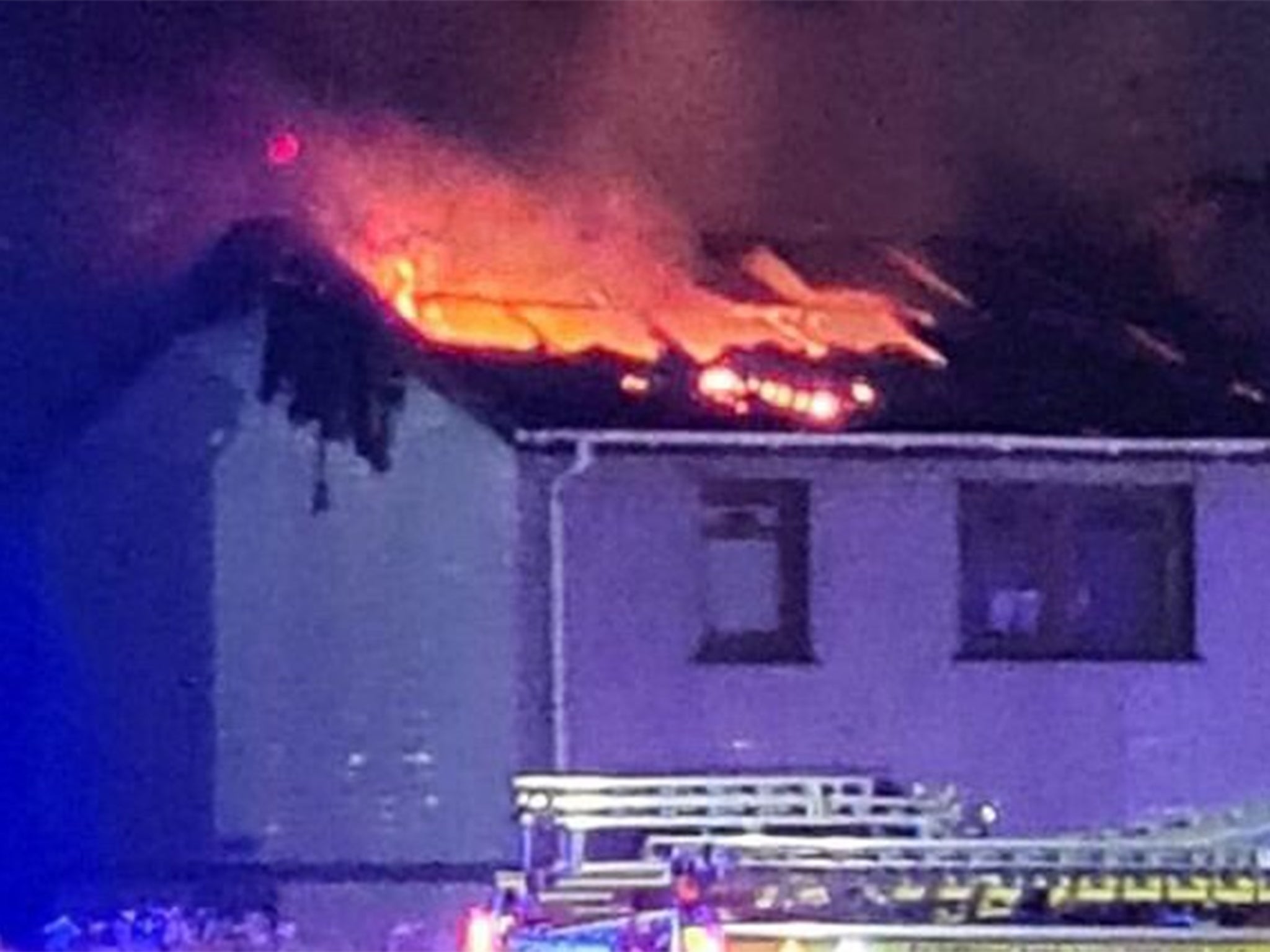 <p>Two homes in Lanarkshire were gutted in a blaze sparked by a stray firework</p>