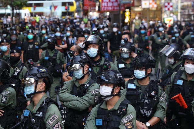 Police officers stand guard during a banned rally on China's National Day in Hong Kong, China, 01 October 2020.