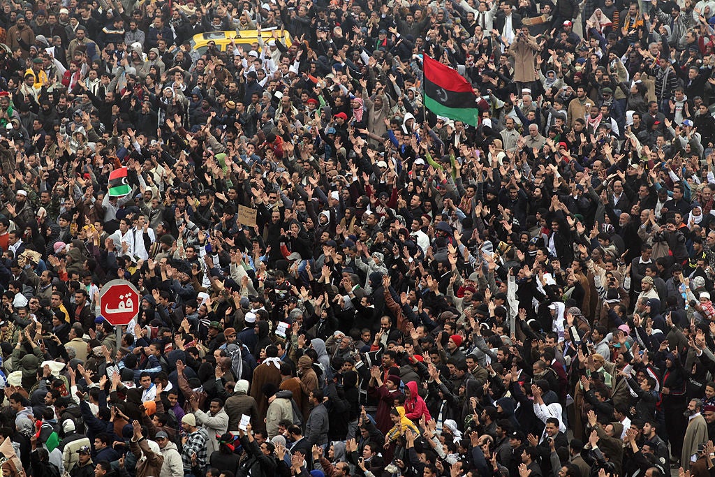 Libyans in Benghazi demonstrate for the removal of Muammar Gaddafi in February 2011