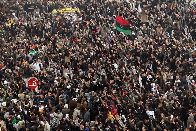 <p>Libyans in Benghazi demonstrate for the removal of Muammar Gaddafi in February 2011</p>