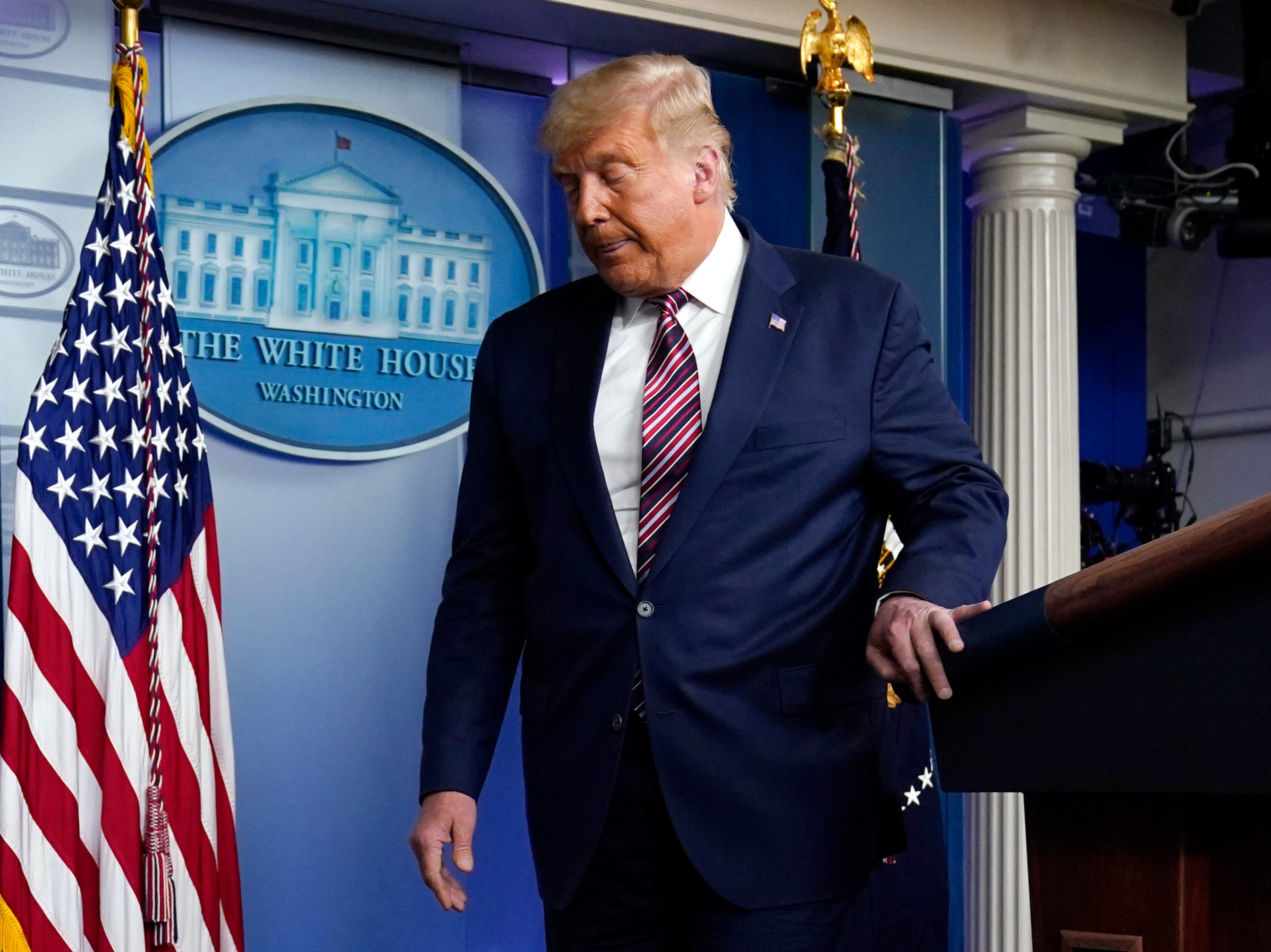 Exit stage left? Donald Trump leaves the podium after speaking at the White House on Thursday