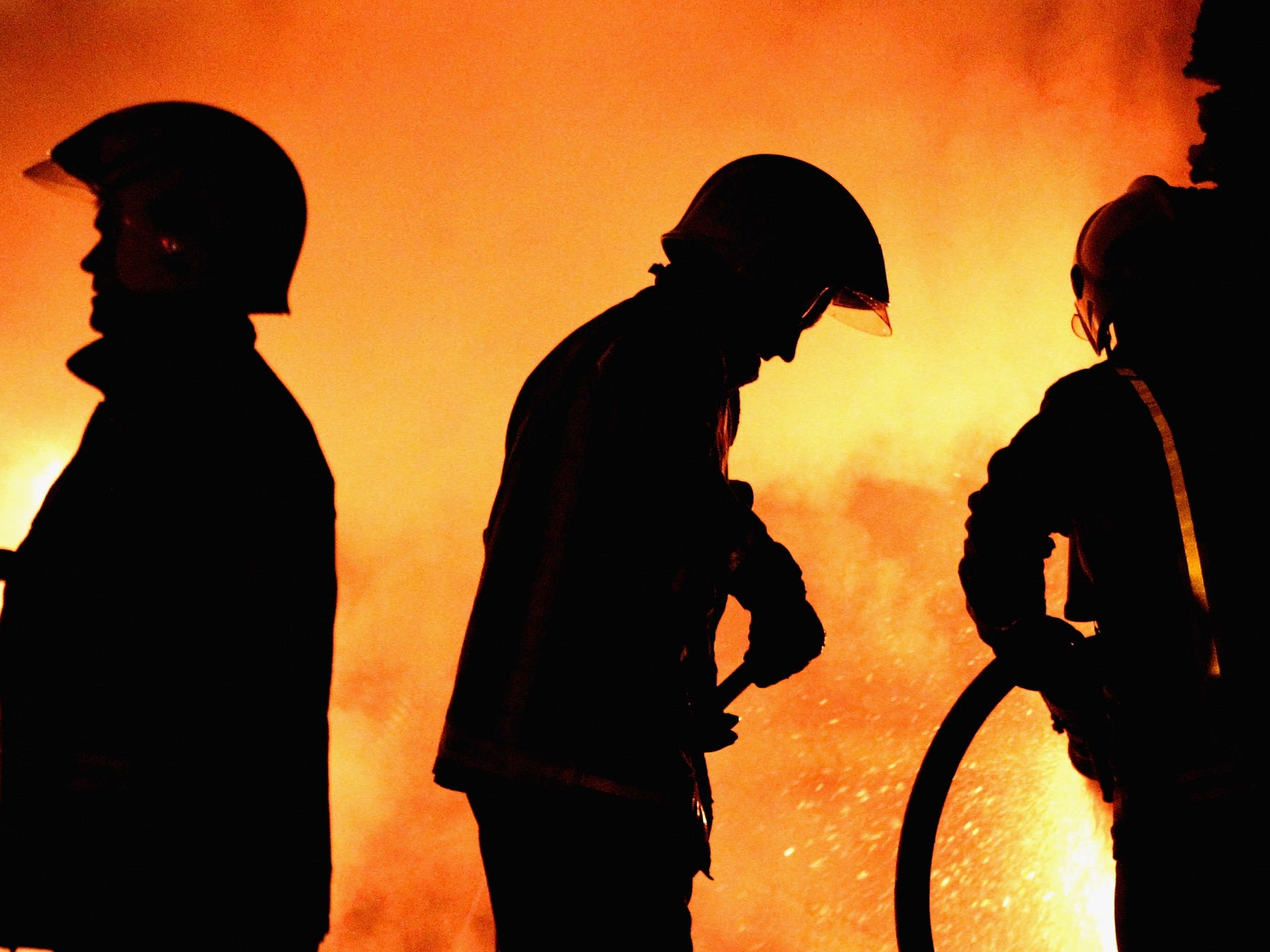 Firefighters attend a fire in Glasgow
