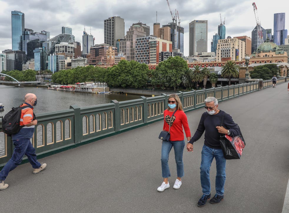 <p>People out and about in Melbourne following the easing of lockdown restrictions on 28 October</p>