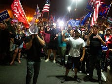 Trump supporters scream at Telemundo reporter outside Arizona count