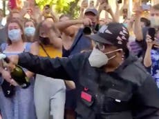 Spike Lee cracks open bottle of champagne in streets as Joe Biden wins