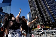 'Kick him out': New Yorkers celebrate outside Trump Tower