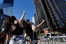'Kick him out': New Yorkers celebrate outside Trump Tower on 5th Avenue