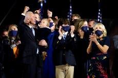 Joe Biden kisses new grandchild surrounded by family in victory speech