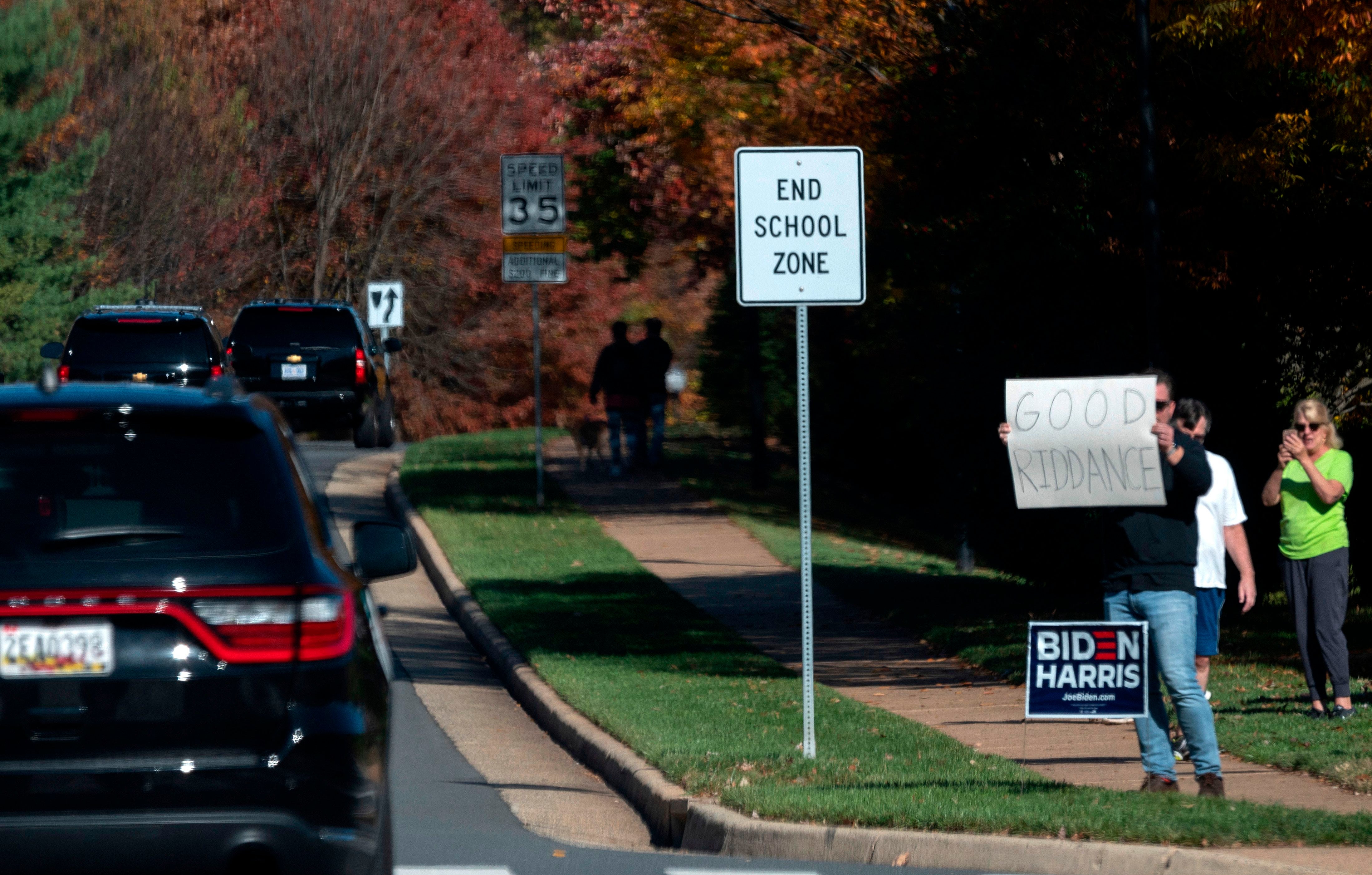 President Donald Trump’s motorcade drove past Americans celebrating Joe Biden’s presidential win on Saturday