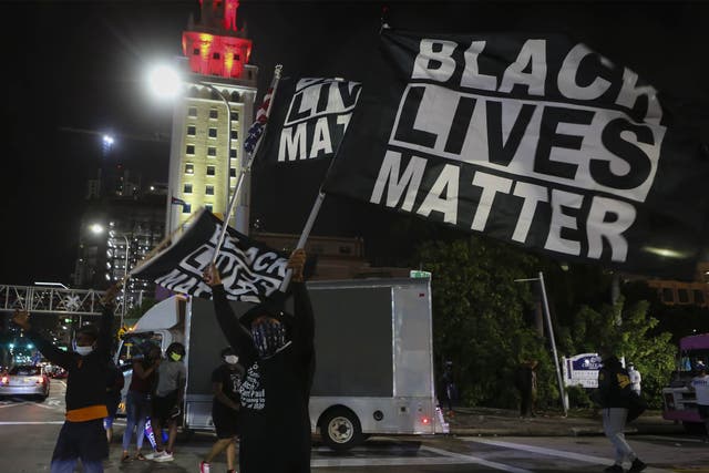 <p>Black Lives Matter protestors celebrating Joe Biden’s win as 46th US President in Miami, Florida, 7 November</p>