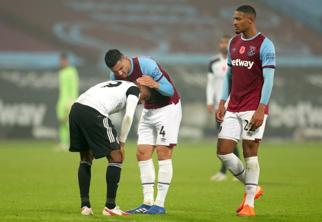 West Ham’s Fabian Balbuena consoles Ademola Lookman at full-time