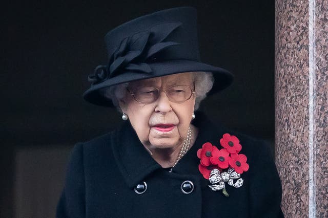 <p>The Queen wore five poppies &nbsp;(POOL/AFP via Getty Images)</p>