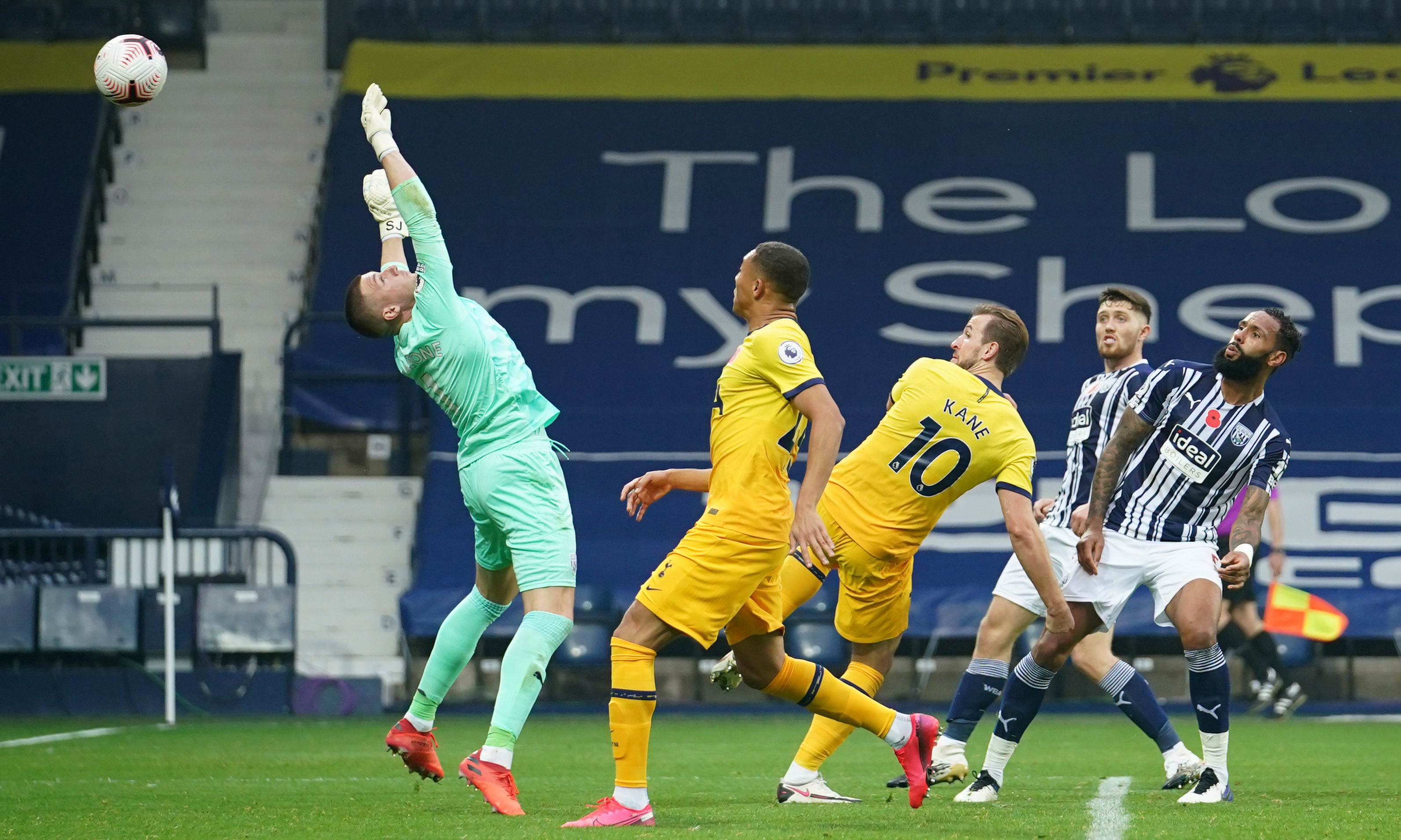 Harry Kane directs a looping header home