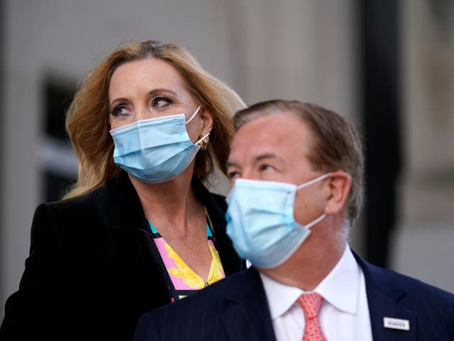 Mark and Patricia McCloskey leave following a court hearing on Wednesday 14 October 2020, in St. Louis