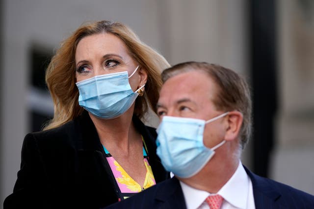 Mark and Patricia McCloskey leave following a court hearing on Wednesday 14 October 2020, in St. Louis